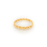 Gold ring with a twisted design on a white background