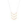 Gold necklace with chevron design on a white background