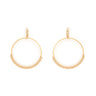 Gold hoop earrings with quartz beads on a white background